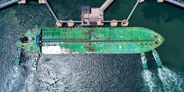 QINGDAO, CHINA - JUNE 12, 2025 - An oil tanker fully loaded with imported crude oil docked at the Qingdao Port terminal with the assistance of a tugboat in Qingdao City, Shandong Province, China on June 12, 2025. (Photo credit should read CFOTO/Future Publishing via Getty Images)