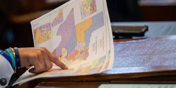 AUSTIN, TEXAS - AUGUST 20: Texas Republican Rep. Marc LaHood views a map during a House meeting in the State Capitol on August 20, 2025 in Austin, Texas. Texas lawmakers continue convening during a second special session over a newly introduced plan to redraw Texas' congressional maps ahead of the 2026 midterm elections. (Photo by Brandon Bell/Getty Images)