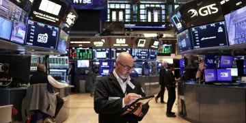 A trader works on the floor at the New York Stock Exchange (NYSE) in New York City, U.S., September 3, 2025. REUTERS/Jeenah Moon/File Photo